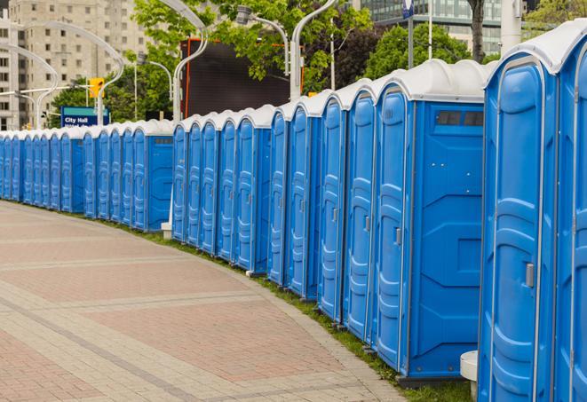 hygienic portable restrooms lined up at a beach party, ensuring guests have access to the necessary facilities while enjoying the sun and sand in Hawaiian Gardens